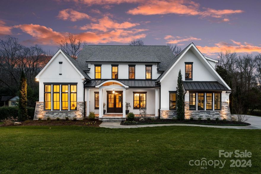 Discover the epitome of luxury living in this newer transitional custom-built home nestled on a private lot with a serene oversized backyard on a cul-de-sac street. Boasting 5BR/4.1BA, this home is a testament to thoughtful design and meticulous attention to detail. Step inside to be greeted by the allure of exquisite custom craftsmanship and finishes that adorn both the main and upper levels. White oak wood flooring graces the entire main level. Main level consist of the primary bedroom/bathroom, and two walk-in closets. The main level guest bedroom with full bathroom opens to the covered back terrace. Retracting doors effortlessly connect the outdoor and indoor spaces, unveiling a covered patio that transforms into a perfect entertaining haven. With a perfect blend of sophistication and comfort, this home invites you to experience a lifestyle where every detail has been curated for a seamless and luxurious living experience. Walking distance to Providence Day School and all shoppes!