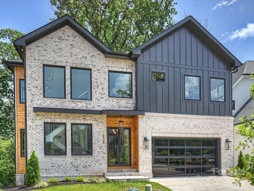 It's as if you're living in an incredibly stylish treehouse!  Stunning design in a new gated community that's convenient to all South Charlotte has to offer.  Main level features a large chef's kitchen with scullery and spacious great room with gas fireplace.  The main level also includes flex space for a formal dining room or office.  The large deck off of the great room also includes a fireplace and has views of the wooded creek buffer.  The upper level includes the primary suite with spa-like bath and oversized closet, plus 3 additional bedrooms.  The walkout basement has a large entertaining space with wet bar/kitchenette.  Additional homes are currently under construction on the block, ask for information.  The community is an active construction site, please use caution.  Tax value is based on the lot value only.