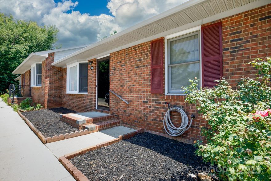 Beautifully updated 2BR/1.5BA end-unit condo in the desirable Cherry Farms community! Just minutes from parks and the heart of Rock Hill, this home offers comfort and convenience. The spacious primary bedroom includes a generous walk-in closet and a private half bath. The bright secondary bedroom is perfect for guests, a home office, or both. Stylish flooring was updated in 2022, and a brand-new HVAC system was installed in 2023. The kitchen shines with stainless steel appliances and abundant cabinet space. Enjoy the oversized laundry room and step out the back door to your own peaceful greenspace. Perfect for first-time buyers—why rent when you can own?