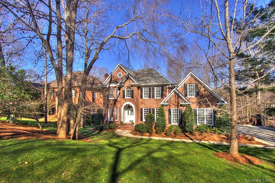 Gorgeous Custom, one owner in highly sought after Berkeley Subdivision. Spacious home, pristine condition, offers beautifully finished basement w 2nd FP, BR, full bath, office, billiard, rec & exercise space & lots of natural light.  Main w wood floors, walls of windows overlooking private, wooded backyard. ALL BRs are HUGE w direct access to full bath. Wonderful storage, updates, location, top schools & quick access to 485 & Ballantyne area shops/restaurants.  PERFECTION!