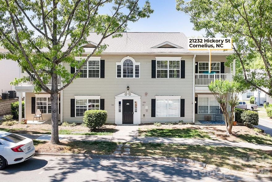 Adorable 2 Bedroom upstairs corner Condo in the heart of Cornelius!  Walk to everything that is downtown Cornelius including the new Cain Center for the Arts. Private front and back covered balconies for enjoying the outdoors. Tons of natural light inside. Corner Fireplace in Living Room. Large Kitchen and Dining Area. Plenty of space for entertaining. Kitchen refrigerator, washer and dryer included. Split bedroom floorplan for added privacy. Primary bedroom has huge walk in closet, private bathroom with shower and garden tub. More recent updates include New dishwasher and HVAC in 2025. Completely Painted in 2022. New flooring, Refrigerator, washer and dryer in 2018. Community features swimming pool and club house. Coded exterior front door entrance for extra security to the building itself. Private entrance to the condo upstairs. Affordable living in the heart of Cornelius! Must see and move in ready!