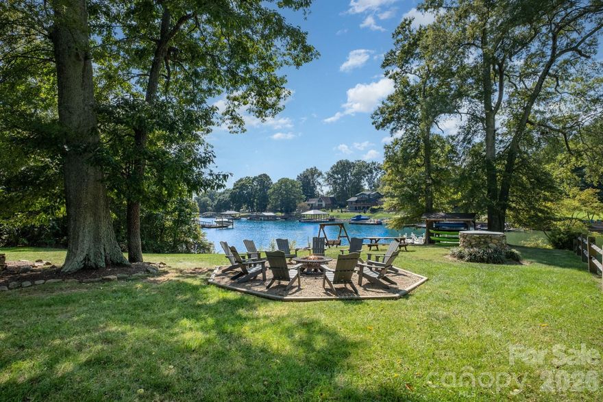Lake living at its best! Located on a quiet cove on Lake Norman, waterfront adventure awaits at this incredible property set on a large .85 acre lot with 130' of shoreline along with a private pier and floating dock. Total relaxation awaits as you enter your long driveway taking you to your slice of heaven while only minutes to great retail shopping, dining and interstate access. This fabulous home boasts shiplap ceilings and accent walls, two gorgeous stone fireplaces, custom cabinets in the kitchen. and an enviable backyard and waterfront setting. The large open-concept chef's kitchen & living room offer exquisite views of the water from sliding glass doors that lead to a spacious deck, outdoor living space and outdoor fireplace. Upstairs, the primary bedroom features a private deck and en-suite bathroom and you'll find 2 additional well appointed bedrooms and a shared bathroom along with an office. An attached 2 car garage is currently set up as a game room but will easily convert back to a garage. Vacation year round in this delightful, waterfront home or continue using it as a short term vacation rental, as the current owners do! Locked owners' closets are in place for you to rent the home out if you choose to. It's great to have options! Turn-key! All appliances, indoor and outdoor furniture, supplies, watercraft and games convey. New Roof Nov 2025.