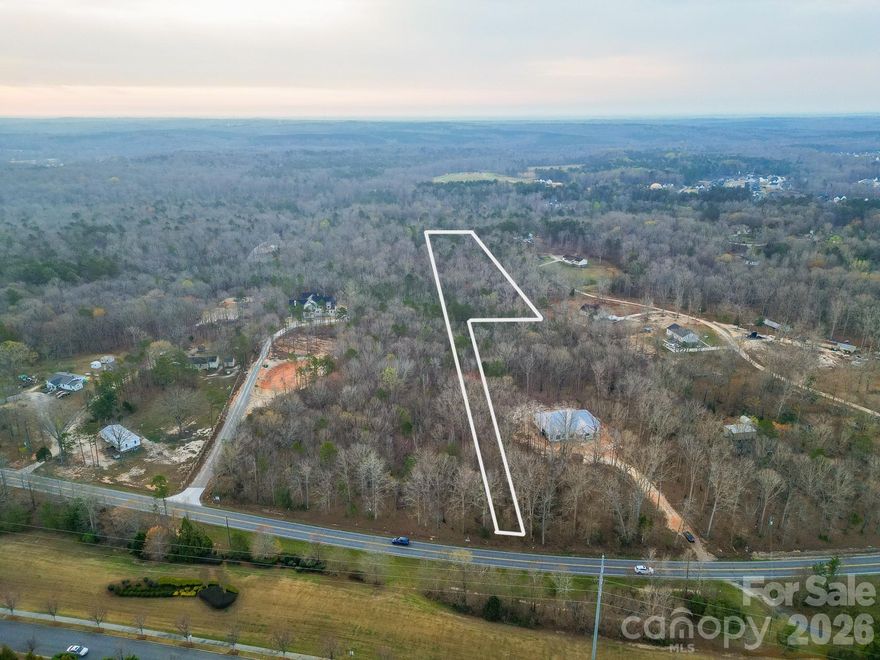 Discover an exceptional opportunity to own 2 beautiful wooded acres in the highly sought-after community between Van Wyck and Indian Land SC. Tucked away in a peaceful and scenic setting, this property offers the rare combination of privacy, natural beauty, and close proximity to modern conveniences. 
Surrounded by new &  custom homes, this homesite provides the perfect backdrop for your dream residence. The land is fully wooded, offering mature trees, shade, and the flexibility to design your ideal homesite layout while preserving the environment. Located in an area known for its excellent schools and small-town charm, you’ll enjoy the best of both worlds—quiet country living with quick access to nearby shopping, dining, and commuter routes. With very few land opportunities available in the area, this property stands out as a rare find. Bring your builder and vision to create a custom estate in one of the most desirable pockets of Lancaster County. No HOA, no timeline to build—just endless potential.