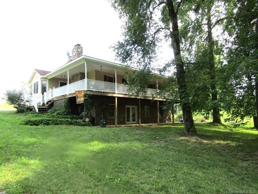 Country BEAUTY!  Fenced Pastures, Rock Face Front on the lower level of the home with Open Views of the Pastures and Woods...Wrap around front porch perfect for evening entertaining in the summer.  Master Suite is HUGE and features and walk in shower and Garden Tub for relaxing after working on the grounds.  This home is nestled in a true country, mountain feel surrounding....Sure to please if you love star gazing of the evenings...