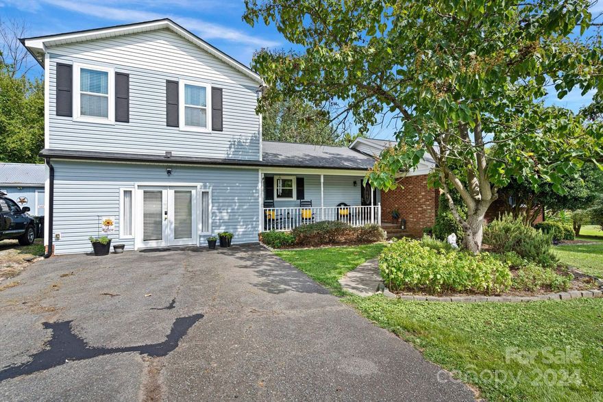 Come check out this home you have been waiting for...  with plenty of living space on the main level, but also perfect for multi-gen living...  upstairs bedroom can serve also as a bonus room, home office space, in home gym, the possibilities are endless.  Enjoy a home in this well established neighborhood convenient to beautiful Frank Liske Park, shopping, restaurants, and sporting events.  Enjoy these awesome features:  LVT flooring, neutral paint, new interior doors throughout, spacious privacy fenced backyard with patio, and free standing 20x20 workshop up fit with electricity!  Also walk into all the appliances you need...  stove, dishwasher, refrigerator, microwave all convey.  Schedule your showing today!