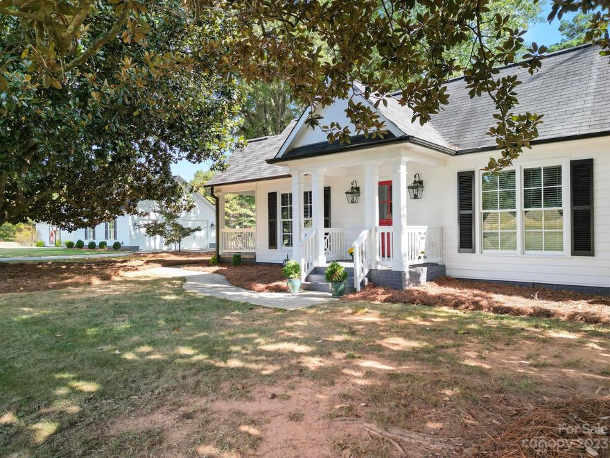 Discover the perfect blend of charm, character, privacy, and quality in this fully remodeled farmhouse, lovingly restored from a generational home. As you approach along the long driveway shaded by trees planted in the 1940s, you'll find an oversized detached garage for ample storage. Additionally, there's a barn with electrical hookups, ready to accommodate farm life. Inside the home, craftsmanship shines through with beautiful hardwood floors, intricate trim work, and an oversized laundry room. Step into the kitchen, equipped with a Viking gas range, marble backsplash with intricate inlay, a farmhouse sink, floor-to-ceiling cabinets, and a walk-in pantry. Spacious primary bedroom with a stunning standalone claw foot tub in primary bath. This property invites you to create your own farm-to-table experience and make cherished memories while enjoying the country lifestyle, minutes away from the conveniences of Mooresville. Next door property is for sale 1395 Centenary Church Rd.