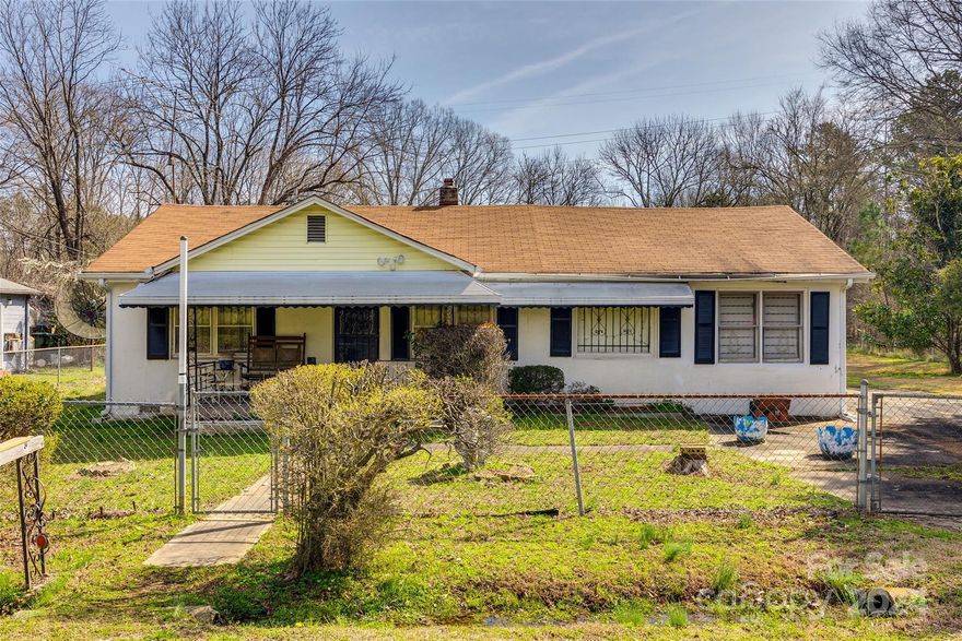 This fixer-upper could make a lucrative investment for the savvy investor. With potential space to create a third bedroom, and a second bathroom, the home awaits a creative touch. The double lot opens the door for upgrading the appeal of the home with fresh landscaping and potential for outdoor living space. Centrally located just a few minutes from downtown Rock Hill, this private street offers the convenience and charm of the city, without the noise. Don't miss your chance to make a wise investment, schedule a showing today.