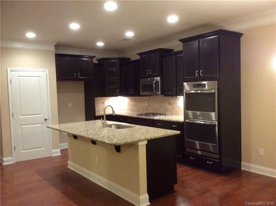 Beautiful master down home, with 3 oversized secondary guest bedrooms and a massive rec room sure tobacco after your pool table and make the perfect fun zone upstairs! Talk about a stunning kitchen... This home has just that!!! A large chef's kitchen appointed with all of the finest upgrades that you have grown to love: Kitchen island, Granite countertops, tile backsplash, elegant brushed nickel faucets, Staggered Cabinets, Stainless Kitchen appliances, Hardwoods floors & recess lights.