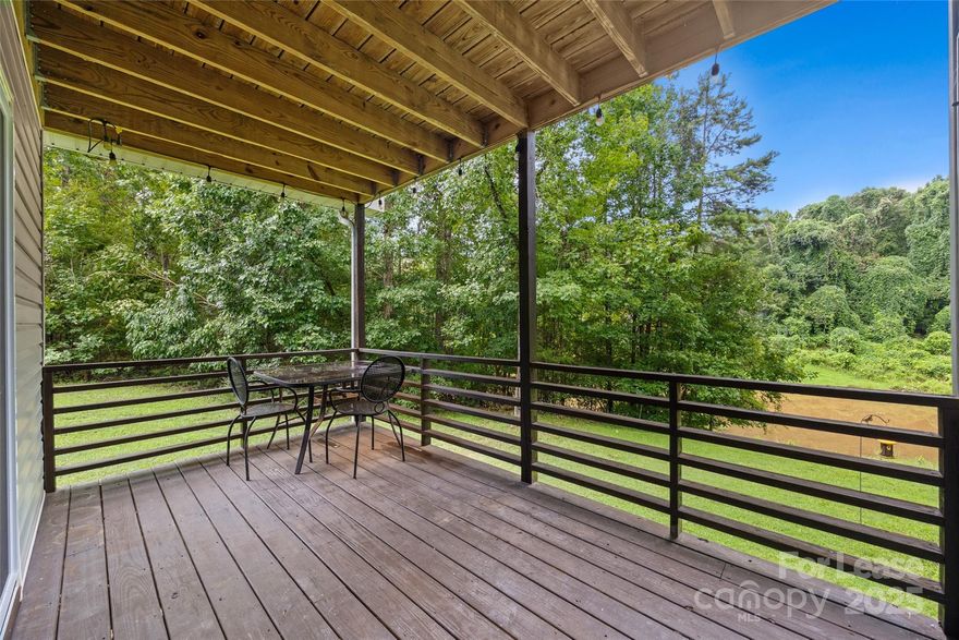 This Fully furnished 1-bedroom, 1-bath Gem is a rare find! An apt with a Waterview and access to a fishing pond! This unit has a private covered deck facing the pond and is perfect for relaxing after a hard day or simply enjoying nature. It is located on the ground level of this property with an exterior entrance. The entrance is on the left side behind the stairs. The spacious bedroom has a large closet. The kitchen features SS appliances and a tiled backsplash. The living, dining, and kitchen areas are one large room and connect to the deck with sliders that offer natural light. A full bath with a shower/tub combo in the hall and a washer/dryer combo in the closet. Parking is the carport in the center.  Brand new HVAC. Electric, water, sewer, & WIFI  included in rental rate. Pets conditional. The Owner will manage the property.