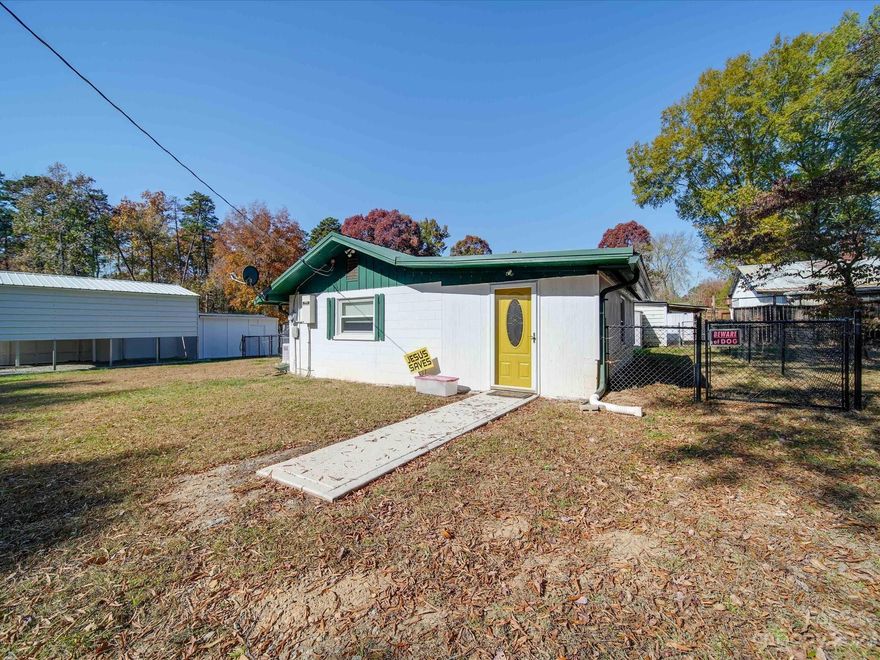 Cute bungalow with all the bells and whistles. Generac generator, tankless water heater, two mini splits plus a gas warm morning heater, private well with good water and backflow system installed, septic tank just been serviced, Bosch dishwasher, gas stove, new bathroom remodel, energy efficient windows, raised beds for gardening, workshop with two additional buildings, concrete pad for your own outdoor kitchen. Comes with a sticker for the private boat launch just a few blocks away. Utility bill ran between 85 and 125 a month with NO water or sewer bill added!!!! This is all on a double lot with a boat shed already on site.