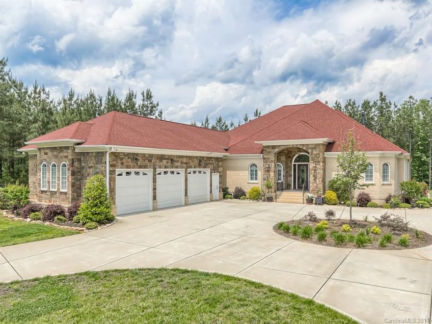 This beautiful ranch w/bonus has wood floors on main, tray ceilings, gorgeous moldings/built-ins & a gourmet kitchen with all the bells & whistles-including a fabulous walk-in pantry! Double walk-ins in master suite & a spa bathroom w/heated tile floors. Enjoy the expansive covered porch & private backyard. Storage galore, tankless water heater, irrigation sys.& much more!  Come discover it today!