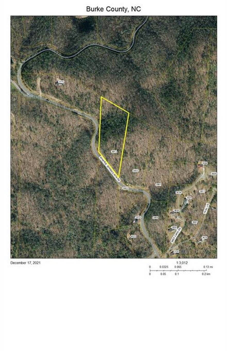 Lot # 1 of Charles & John Lowman Estate. Plat Bk. 8 Pg. 45. Water available-3/4 " $1100, Meter-$200 & Deposit-$150.00. Septic would be needed. Build your home and have a great view. REA electricity. Doublewides and singlewides allowed.