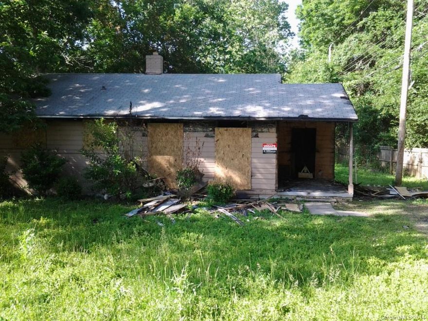 GREAT INVESTMENT OPPORTUNITY!!!  Property listed $80k below tax value; was in fire incident and needs renovations.  Minutes away from Noda area and I-85 highway.  BRING US YOUR OFFER.