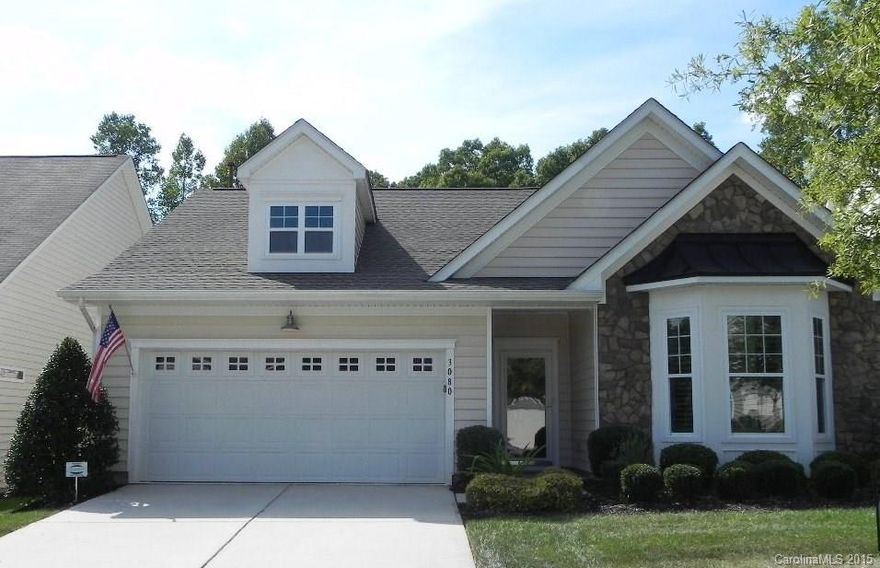 This home has lots of upgrades with 5" hardwood floors and plantation shutters throughout. Stainless steel appliances, upgraded creamy white cabinets, under cabinet lighting. Master bedroom with bay window. Large screened porch backing up to a wooded private area.