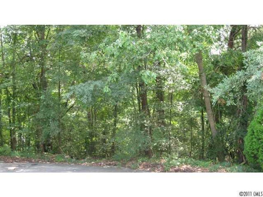 This lot is a beauty! This cul-de-sac lot and a wide greenbelt space adjacent to Golf Course. So many wonderful views. Walk to the lake. Bring your own builder! Adjacent lot, 6034 Agate Ct., also available for sale.  Both lots may be purchased together for $49,900.