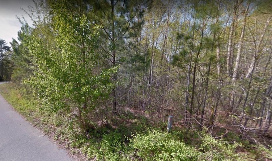 Half acre lot for sale in a peaceful neighborhood near Lake Hickory.  Build your home on this lot and enjoy what Grace Harbour has to offer.   
The lot has a slope from front to back.  A perc test had been done 18 years ago, but a septic system was never installed.  County water, but seller is unsure if Tap was previously paid for by Developer.
There's a small stream toward the back of the property.  We are listing it BELOW appraised value.  Buyers, contact me today!  You will love the beautiful homes in this neighborhood.  Build yours here too!