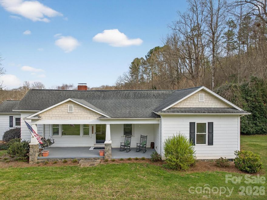 Welcome to this truly one-of-a-kind country retreat featuring 17.54 acres of beautiful  land, complete with a wide, scenic creek and abundant wildlife. This unique property offers the perfect blend of charm, functionality, and natural beauty, including a pond, barn, and multiple farm-style outbuildings such as a classic spring house, wood shed, and covered walkway.  A long private driveway leads you to a charming beautiful home filled with warmth and character.  Primary bathroom has a tile shower. The inviting family room is bathed in natural light from numerous windows and features a cozy standalone fireplace, creating the perfect gathering space.  Step outside to a stunning covered back or front porch where you can relax on the porch and take in the breathtaking, expansive views of your land. Whether you’re enjoying quiet mornings or peaceful evenings, this setting is truly special.  Additional features include a multi-car detached carport connected to a versatile multi-use garage, ideal for hobbies, storage, or workspace. With ample farmland and a beautiful creek bordering part of the property, this is a rare opportunity to own a unique piece of countryside paradise. Must see to fully appreciate—don’t miss this exceptional opportunity!