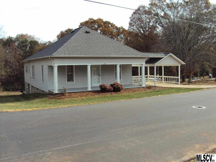Updated bungalow. This two bedroom two bath home is situated on 5.45 acres. The home had a new HVAC system installed in 2012 as well as a new roof in 2011. Large eat in kitchen. The detached single garage would make a great workshop. Very convenient location.