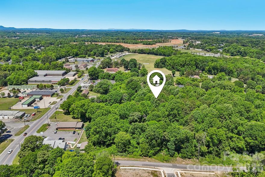 Build your dream home on this beautiful .23-acre wooded residential lot nestled in a peaceful natural setting. Surrounded by mature trees and offering plenty of privacy, this property provides the perfect balance of tranquility and convenience. Ideal for a custom home, the lot offers a serene atmosphere with ample space for outdoor living, gardening, or simply enjoying nature. Whether you're looking to build now or invest for the future, this wooded parcel is a great opportunity to own residential land in a desirable setting.