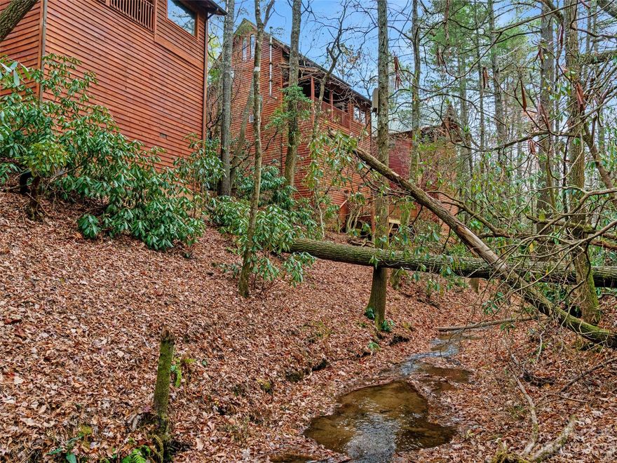 2 Lots - Buy at $35,000/ea or $60,000 for both!
Located in the desirable Bear Den Campground area and just minutes from the Blue Ridge parkway. Also within walking distance to conservatory hiking trails! Two 0.27 acre lots (buy both) ready for your house plans and builder. Same family has owned these lots for multiple generations! The long range mountain views shown in the drone photos are not from the property but are representative of the area. The lots are part of a community water system. Buyer will need to hook to that system and not drill an individual well.  Also, taps in place (1 on each lot) to hook up to community sewer system.