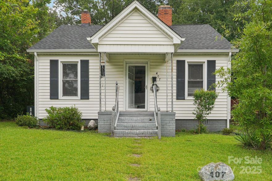 Welcome home to this charming Rock Hill cottage! Set on a spacious lot with a brand new roof (2024) and easy-care vinyl siding, this home is as practical as it is adorable. Step inside to a cozy living room with nearly new carpet—plus original hardwoods underneath if you ever want a vintage touch! The kitchen offers ample space and everything you need, while the oversized laundry/mudroom provides tons of extra storage. With 2 comfortable bedrooms, 1 full bath, and closet space in each bedroom, this home is just the right size. Enjoy the outdoors from the rear deck—perfect for grilling or relaxing. Great for first-time buyers, downsizers, or investors! All appliances are included. Be sure to check out the 3D tour.