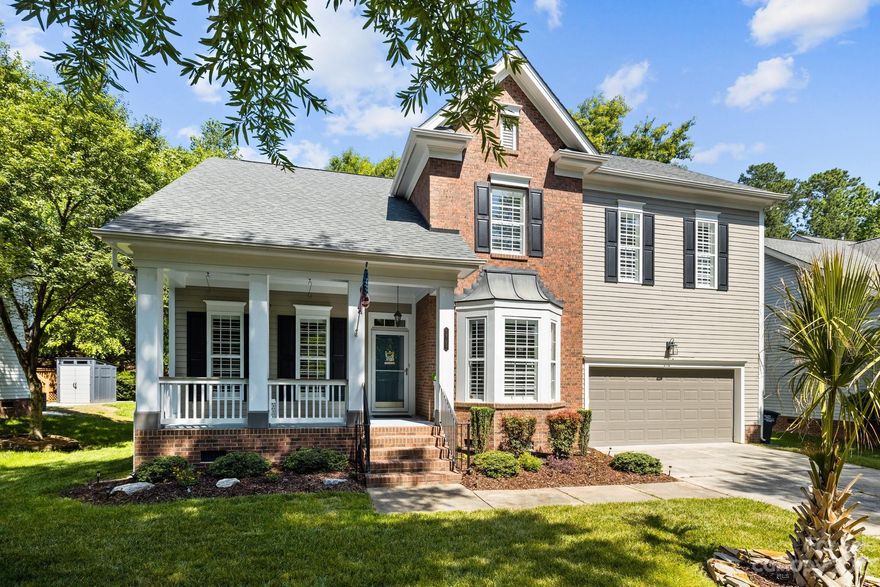 This is the one you have been waiting for! Sought after Tega Cay location with a wooded backyard oasis complete with a paver patio, firepit, fenced yard, and stringed lights in a private setting. Inside enjoy an open floorplan, a beautiful modern farmhouse kitchen, granite counters, gas range, elegant dining room, an office with glass French doors for privacy, vaulted ceilings in the family room, HW floors, spacious main level primary bedroom, customized closet and Plantation Shutters. Upstairs features 3 additional BR's, a bonus room, walk in storage, a flex room that could serve as a media room, workout space or playroom. This home as been well maintained with a new roof in 2021, new HVAC's in 2021, there is in ground irrigation and this home sits on one of the prettiest streets in Tega Cay! Don't forget it is just a short walk to the school and the community boast some of the best amenities, including lake access, golf, ballparks, pool, clubhouse, walking trails, tennis and more!