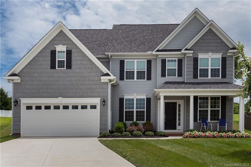 Immaculate custom built 2015 Energy Star certified home on 1/3 acre lot on a quiet cul-de-sac in the Gates at Waterside Crossing in east Lincoln Co. This 5 bedroom, 3 bath colonial has lots of features & upgrades, 5 burner gas range, s/s appliances, granite counter tops, 42" maple cabinets, soft-close drawers, drop zone, master w/ trey & 2 large walk-in closets, irrigation system, hardwood floors throughout first floor, garden tub, huge bonus room w/trey, stain resistant carpeting, Must See!