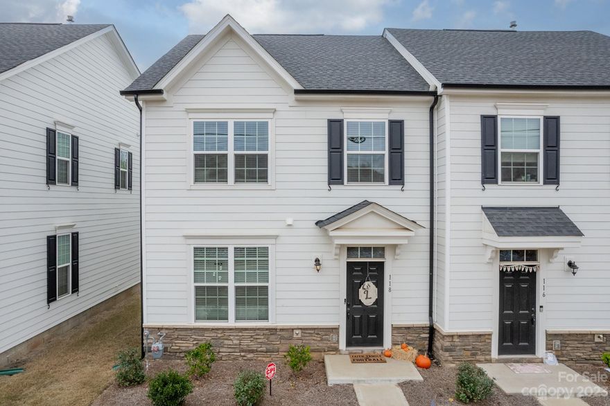 Stunning end unit townhome in Villages At Cramerton Mills! Main level features an open living concept & beautiful LVP flooring throughout. The great room leads to an open kitchen that features stainless steel appliances, island w/ breakfast bar, pantry, granite countertops, & dining area! A half bathroom completes the main level. The owner’s suite features a walk-in closet & en-suite bathroom w/ a dual vanity & walk-in shower. Secondary bedrooms, bathroom, & laundry room complete the upper level. Fenced-in yard & patio is perfect for entertaining or relaxing! Detached 2-car garage in the rear of the property. Great location close to Belmont, Cramerton, Charlotte, & I-85.