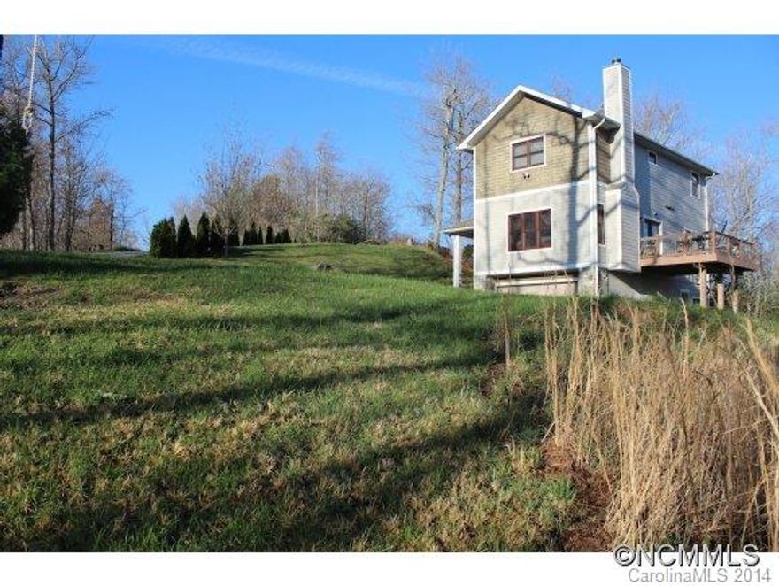 What do the mountains mean to you...great hiking, beautiful views, sitting by a fireplace in the evening, or feeling a cool breeze through an open window as you sleep? This home offers all of those...and much more! You'll find yourself tucked away on 3.91 acres, but located just 20 minutes from the conveniences you've grown accustomed to. Great 4-season home or retreat, good rental history. More pics coming soon.