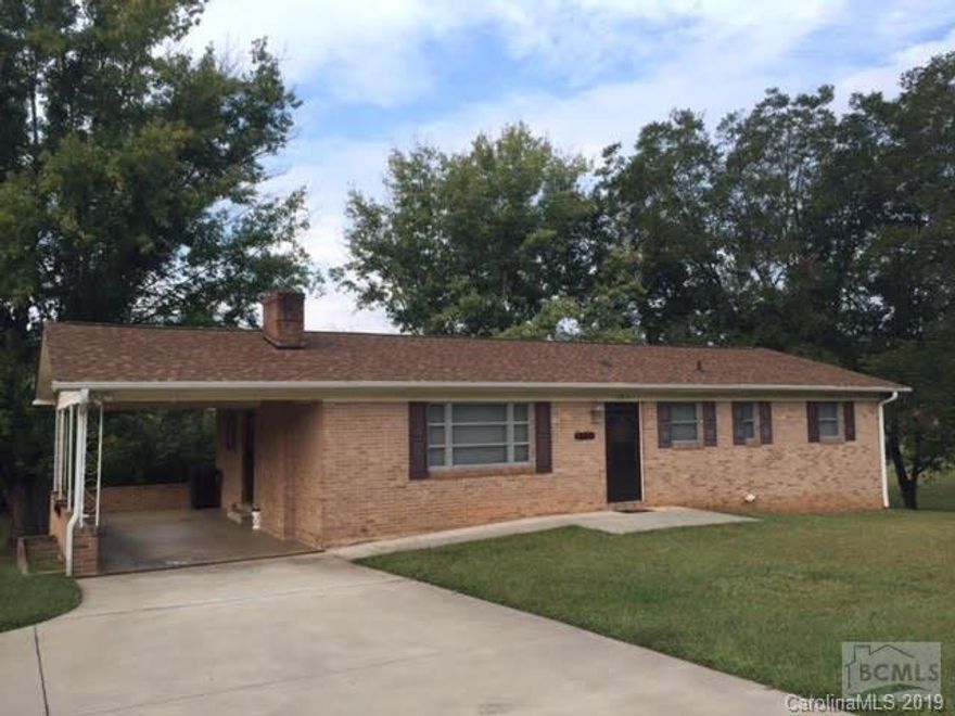Must See!!! This recently updated brick ranch down Hwy 18 South. This 3 bedroom, 2 bath home with a full unfinished basement sits on a total of .67 of acre lot. Sellers are also selling the vacant lot next door with the home. Home consists of large living room with gas fireplace, hardwood floors, open kitchen, tile in baths, his/her sink with newly updated bathrooms and a full basement for plenty of storage. New roof in 2014!!! Home also carries a 1 year home buyer warranty!!!