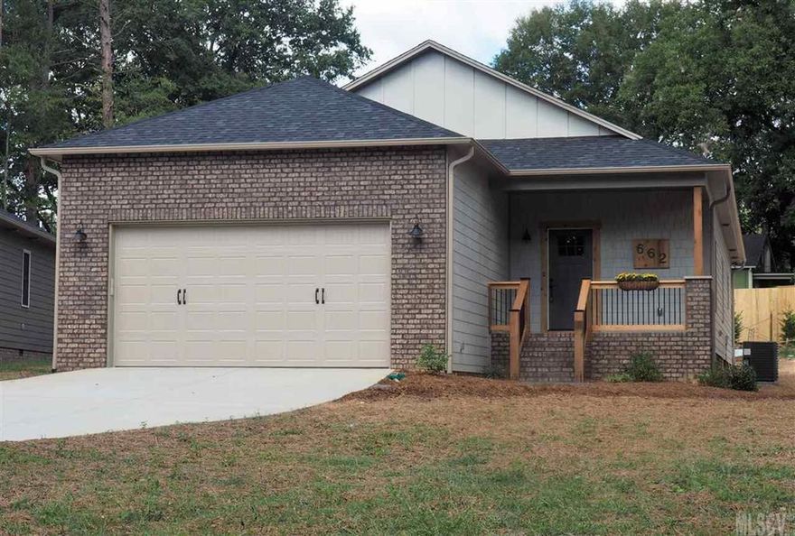 New Construction in desirable NW Hickory! Custom-built home in SterlingStone on Sixth featuring quality, functionality and attention to detail. This one level, Craftsman, modern cottage style 3 bedroom, 2.5 bath has an efficient open floor plan. Stunning tile mosaic accent wall with panoramic fireplace. Custom wood cabinets, stainless steel appliances and oversized kitchen island with eating bar. Granite counter tops in the kitchen, master bath, half bath. Ceiling fans in all bedrooms and living area. Unique light fixtures! Master suite features a huge walk-in closet, double vanities and large tiled shower. Double custom barn doors offer option to close off secondary bedrooms. Covered back porch with privacy screen. Lot backs up to designated green space.