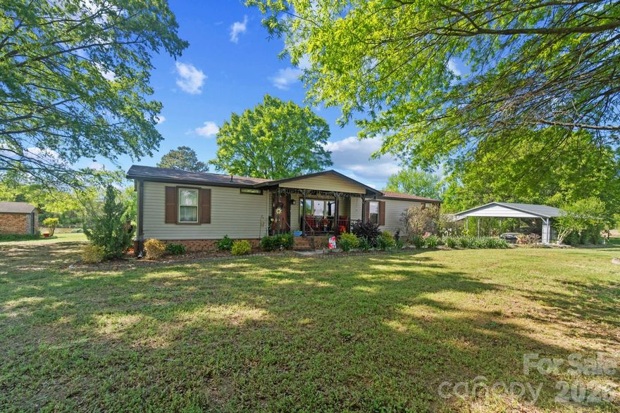 Don’t miss this unique opportunity to own over 8 acres across four parcels in desirable Union County! This manufactured doublewide offers both privacy and versatility, located across from the Union County Sheriff Training Center.

The home features a screened-in porch perfect for relaxing, along with a deck that provides extended space for entertaining family and friends. The kitchen has a farm sink, ovens for different size groups you may be cooking for and quartz counter tops. An encapsulated crawl space adds value and peace of mind. Outside, enjoy a peaceful setting complete with a pond and a fire pit area—ideal for quiet evenings or gatherings.

Additionally the property includes a carport and a detached garage/workshop, offering plenty of room for storage, hobbies, or equipment.

With multiple parcels included, this property presents excellent potential for privacy, expansion, or simply enjoying extra space.

All parcels convey with the sale unless otherwise agreed upon.