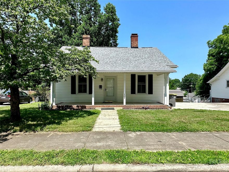 Welcome home! Check out this gorgeous property located only 0.3 miles from the Cannonballers Stadium & all the new & upcoming restaurants/shops Downtown Kannapolis has to offer! This well maintained & updated 2 BR 1 BA home features a permitted addition, which includes a large kitchen w/island, walk in pantry, & laundry room. Fresh paint & flooring throughout! New roof! Spacious 2nd living room/bonus room area contains a wood stove the sellers used as main heat source in the winter. Either living room could easily be converted to make an additional bedroom if desired. Large back deck & fenced in back yard are perfect for entertaining & cookouts! Enjoy monthly concerts in the park & fireworks without the crowd right from your back yard! One of the crawlspace areas has been dug out to provide extra space for storage, & has a retaining wall. Easy access to Bakers Creek Park & Green Way, Village Park, Highway 29, & I-85. Great rental potential for investors. Schedule your showing today!