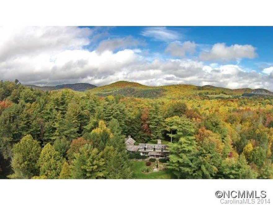 Reflections' is the epitome of a mountain estate situated at over 4,100' of elevation on 42 sprawling acres. As you pass the stone entrance pillars with gas lights, the road meanders past meadows, fenced pastures, and scenic ponds. The tastefully renovated estate features the main house, and several other structures, including the horse stables constructed in 2011.