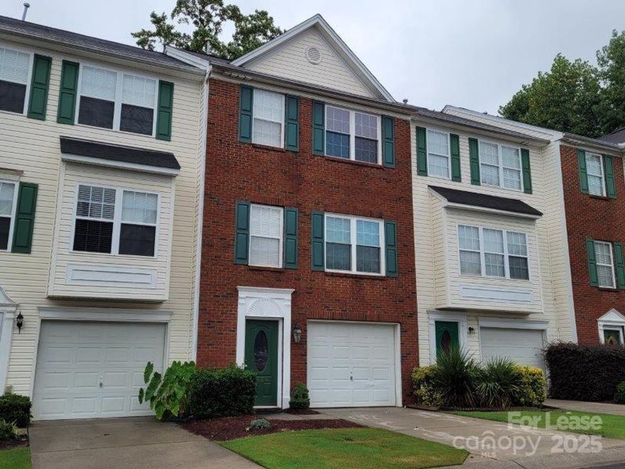 Sought after Waterstone community located in the most vibrant area of Fort Mill. Convenient to I-77 and only minutes to Charlotte. Lots of restaurants and grocery choices nearby. Wonderful three story townhome, approx. 1900 sq ft. 3 bedrooms, 2 full baths and 2 half baths. One attached garage and one driveway parking space. New kitchen countertop, new sink, new stainless steel appliances. Sizable walk-in pantry. Recessed lights throughout the main floor. New luxury vinyl flooring from foyer through the entire main floor. New Trane HVAC system. New roof and gutters. Primary bedroom features walk in closet, high vaulted ceiling. Primary bath features double vanity, garden tub and a separate Shower. Ceiling fans in primary and 2nd bedroom. Three bedrooms on the upper level. A spacious bonus room with a closet on the ground Level, adjacent to a half bath. Deck located on main level. Community swimming pool. Great Schools. Available Now. OWNER IS A LICENSED REAL ESTATE AGENT.