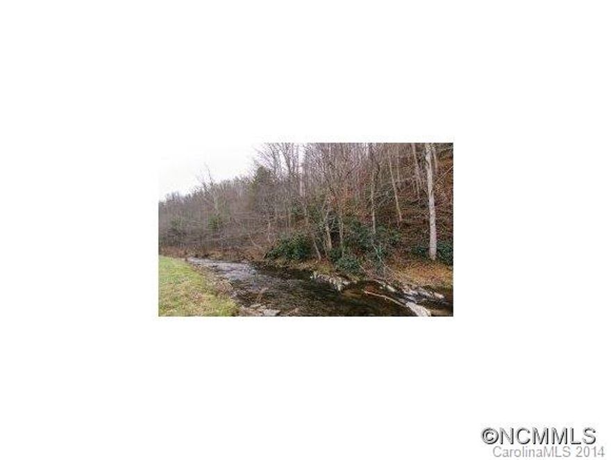 FISHERMANS DREAM, 1000 FEET ON BIG LAUREL CREEK. 65X12 MOBILE COULD BE A WEEKEND GETAWAY OR PLACE TO LIVE WHILE BUILDING HOME ON PROPERTY. ADDED BONUS IS COLD CLEAR SPRING WATER, MOBILE HAS APPALACHIAN WOOD BURNING STOVE WITH TRIPLE LINE VENT AND OIL FURNACE.  PAVED ROAD TO PROPERTY OF 11 GREAT ACRES.