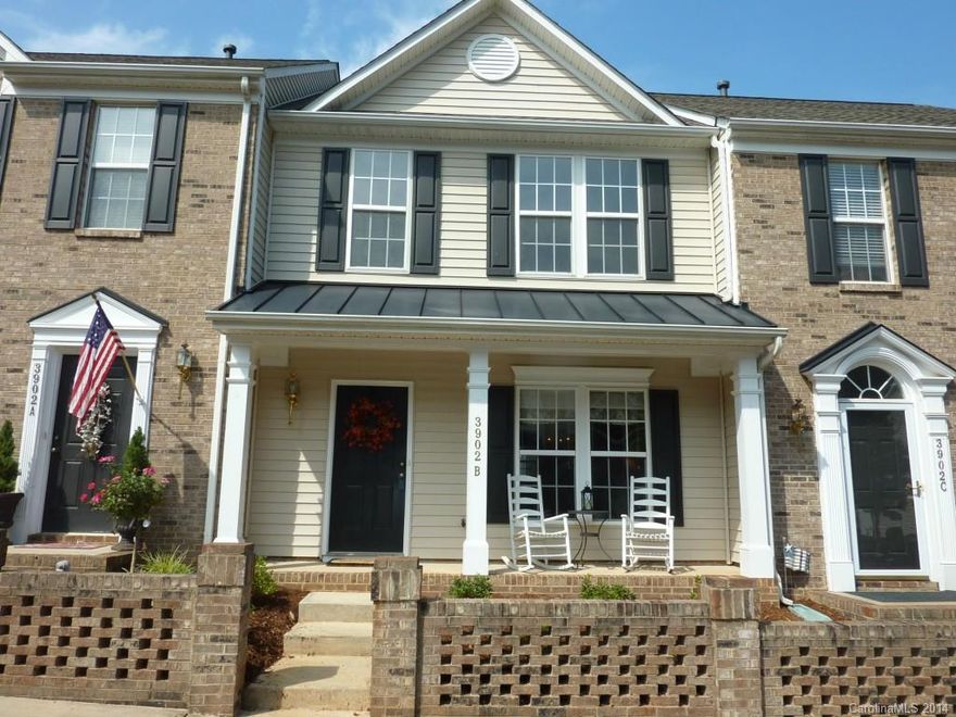 Absolutely adorable front porch unit backing to heavily wooded rear area. Total neutral colors, repainted interior including all baseboards. All new light fixtures (many w/ dimmers) neutral carpet & flooring thru out. Plus 4' rear extension gives this unit a much larger family rm & kitchen & larger MBR & bath. Ceiling fans, 2" blinds, 2nd master sized bedroom w/ double closets. French door to rear patio & separate storage shed plus 2 parking spaces & room for guest! This won't last!