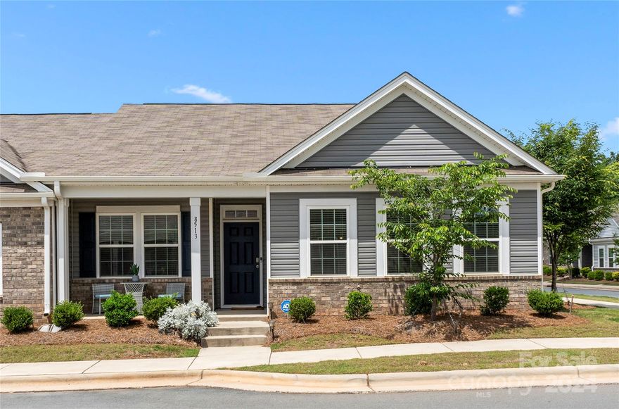Incredible opportunity to own a like-new fantastic end unit townhome conveniently located near downtown Waxhaw! Built in 2020, this townhome boasts numerous upgrades and features 2 bedrooms and 2 full baths on the main floor, along with a spacious Bed/Bonus room on the upper level. The primary bedroom, complete with a large master bath, dual sinks, and a walk-in closet, is also on the main floor for added convenience. Additionally, there's a laundry room on the main floor and a two-car back load garage. Being an end unit, there are extra windows on the side, providing ample natural light throughout. The kitchen is stunning, featuring granite countertops and subway tile backsplash, an island with built-in sink and stainless steel appliances. A walk-in pantry and recessed lighting add to the appeal. This home shows like a model with its meticulous attention to detail. Situated very close to the vibrant downtown Waxhaw area, offering plenty of entertainment, shopping, and dining options.