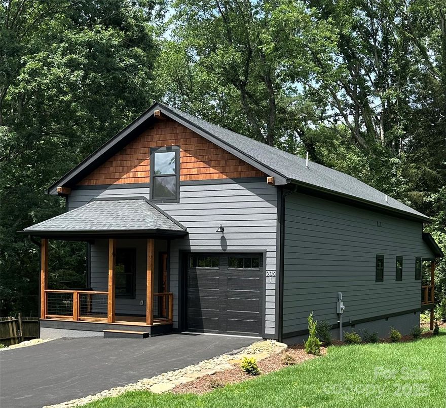 Great location and new construction in Black Mountain! Close to Lake Tomahawk, downtown Black Mountain, and Montreat. The kitchen offers granite countertops, stainless steel appliances, semi-custom shaker cabinets and delta plumbing fixtures. The open concept living and kitchen area are great for entertaining. The porch would be a nice area to grill or just enjoy the mountain air. Primary bedroom is on the main level with an adjoining main bath. The second bedroom on the main level would be a great flex space or office. There are two large bedrooms upstairs, a computer niche and bathroom. This would be a great first home, second mountain home, or an investment property.