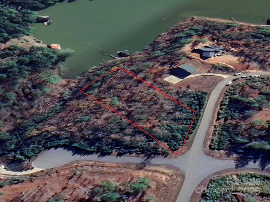 Wonderful opportunity to build your dream lakefront home on Lot 93 in the desirable Granite Falls community. Enjoy direct access to the water and peaceful lake views in a quiet, established neighborhood. This lot offers the perfect setting for a weekend getaway or year-round living. Conveniently located near shopping, dining, and local amenities, while still providing privacy and natural surroundings.