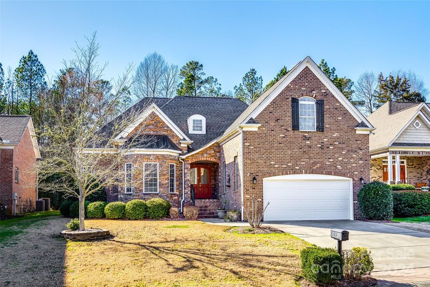 WATERFORD GLEN ON GOLF COURSE lot situated on the 13th hole. Gorgeous 1.5 story, open floor plan, 3bed/2.5ba home. Enter the home through the covered stone porch & beautiful double doors. Large entry foyer opens to the great room with a gas fireplace and leads to the dining area & kitchen. Features include tall ceilings and plantation shutters in the main living area. The kitchen is well-appointed with granite counters, SS/black appliances, & beautiful tile floor. Spacious primary bedroom & two additional bedrooms on main. The primary bedroom has a walk-in closet & ensuite featuring a stand-up shower, dual vanities & linen closet. A laundry room with cabinets and a half bath complete the first floor. Relax & enjoy nature from your covered screened porch equipped with fan & tile floors leading to a composite deck with privacy galore. Upstairs is a large loft/bonus room. Take a short walk through the wooded backyard to the 13th hole. Amenities include a pool, clubhouse, & golf course.