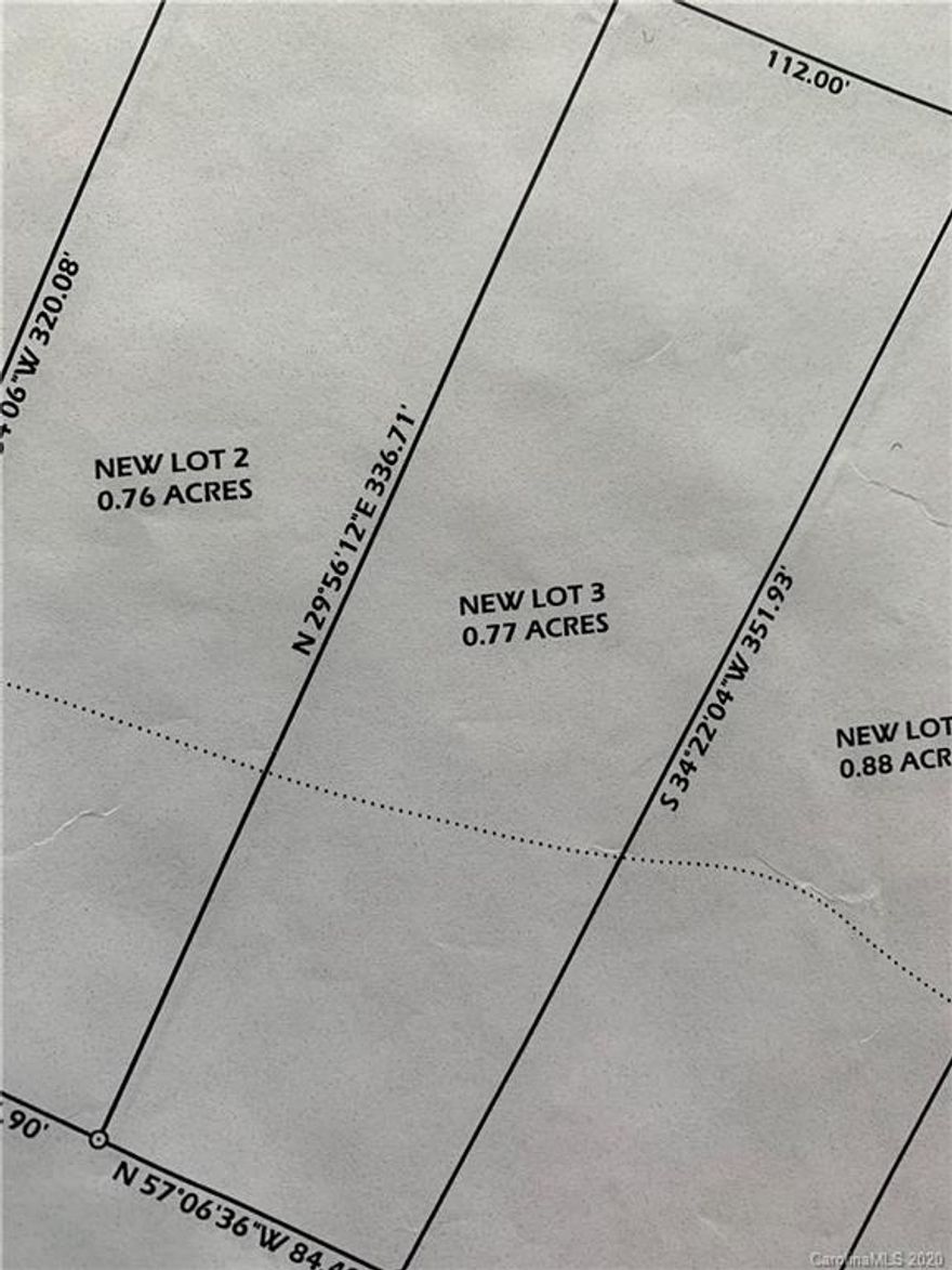 Lot 3 of 5. Beautiful .77 acre property with road frontage and Buffalo Creek running along rear of property.  Has been surveyed and sub-divided to 5 separate lots. 30 Minutes to CLT airport and 45 minutes to Uptown Charlotte.