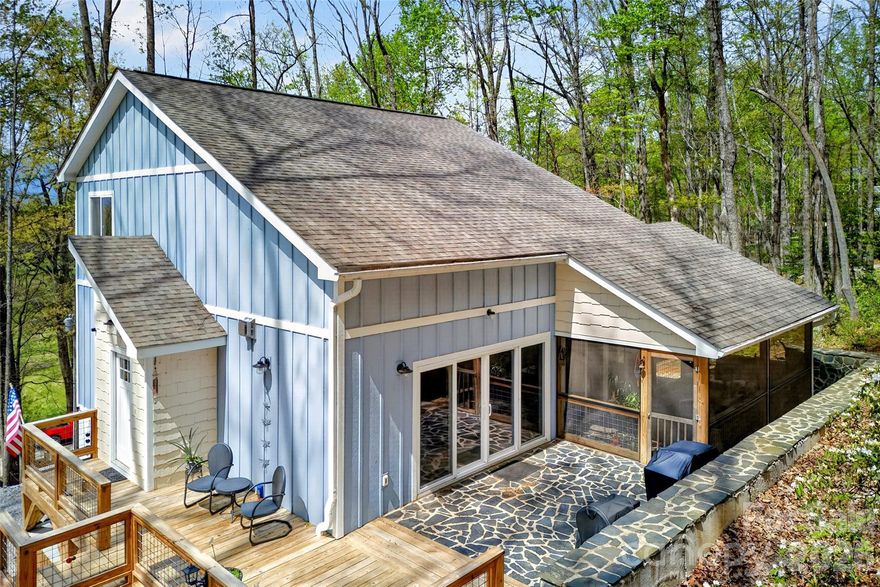 OPEN HOUSE SAT APRIL 18TH 1-3 Custom-built in 2022 and truly move-in ready.  Featuring nearly new construction, mountain views and base camp location to all the popular desitinations Western North Carolina has to offer. Drive to Old Fort in just minutes. No HOA Dues!

The main level features a spacious primary suite with its own private balcony—perfect for enjoying mountain views with your morning coffee. You’ll love the hand-crafted stone patio, open deck, and screened-in porch, ideal for relaxing or entertaining. Inside, the two-story great room showcases soaring ceilings and hardwood floors, creating a bright, open, and inviting space. The main level also includes a laundry room with ample storage and beautiful tile floors. With multiple decks and porches, you’ll enjoy outdoor living year-round.

Upstairs, you’ll find two bedrooms with large windows and mountain views, a full bath, and a cozy sitting area—perfect for reading, relaxing, or working from home.

The lower level offers extra storage, a 443 sq ft industrial-rustic style recreation room (kegerator negotiable, and owner will leave the wiring for easy reconnection), a utility room, garage, and an open workshop area—ideal for hobbies, projects, or creative space.

The exterior is low maintenance, and the thoughtfully designed landscaping blends perfeclt with the natural mountain setting. Follow the short trail to your own private fire pit and soak in the peaceful mountain atmosphere.

This home offers the perfect balance of views and convenience—just 5 minutes to Old Fort, 15 minutes to Black Mountain, and 30 minutes to Asheville. From 1413 Golf Course Road, you truly get the best of both city and country living—without sacrificing either. Short term rentals are allowed in this community.