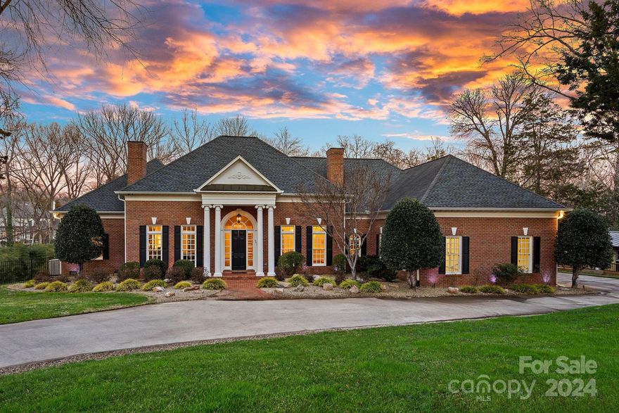 Outstanding private estate spanning over 3+ acres. Fully gated property with keypads for privacy. Custom-built home with grand 12-ft ceilings on the main level, exquisite moldings and hardwood flooring throughout. Large windows flood the interior with natural light. Thought-out details from primary suite on main with dual walk-in closets, chef’s kitchen, family room with fireplace and a wet bar, a custom home theater, and more. Equipped with Kohler generators with surge protection, Control4 automation system, and a built-in surround sound system. Top-of-the-line appliances throughout the home ensure luxury and convenience. A midcentury modern style guest house has a separate entry, offering open floorplan with a bedroom, full bath, kitchen and living area. The outdoor entertainment features a wood-burning fireplace wired for TV, built-in outdoor kitchen, pool and spa with lights and waterfall, and a firepit. Per deed restrictions, lot can be subdivided as small as 1.5 acre per SFR.