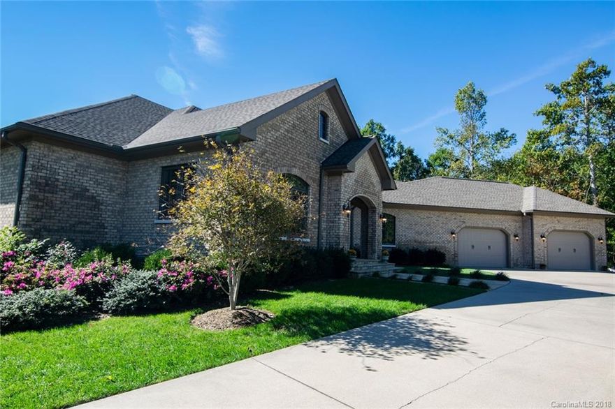 Attention to every detail in this beautiful custom built Kenmure home.  This home has an open floor plan, curb appeal, comfort, elegance and high end finishes throughout. Main level has master suite, office, great room, formal and informal dining, two guest bedrooms with en suite bathrooms, cooks kitchen with granite island and large walk-in pantry, laundry room and three car garage. Take the elevator to the lower level to an inviting family room with  second full kitchen and laundry room, private lower level bedroom suite and large lower level shop or storage.