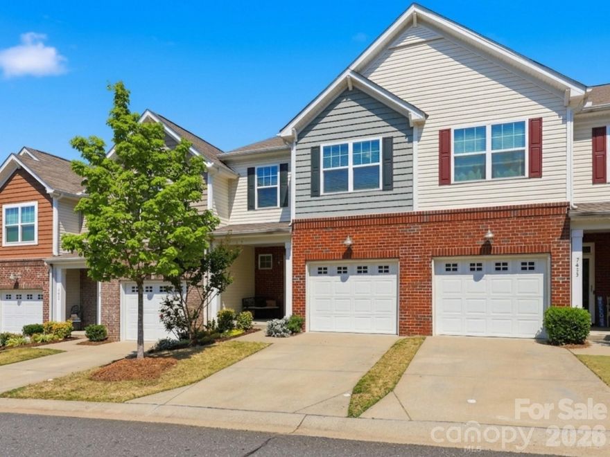 Welcome to low-maintenance living in The Woodlands! This beautifully maintained 3 bed, 2.5 bath townhome in Rock Hill offers an open floor plan and hardwood floors throughout the main level. Open kitchen features granite counters, stainless steel appliances, gas range, dinning area & flows seamlessly into the living area with a cozy fireplace—perfect for entertaining. Upstairs, the spacious primary suite includes dual sinks, a walk-in tiled shower, soaking tub, and a huge walk-in closet. Two additional spacious bedrooms, guest full bath and laundry room upstairs as well.

Enjoy outdoor living on the covered back patio, plus the convenience of an attached 1-car garage with extra overhead storage. Refrigerator, washer & dryer all convey. HOA provides true low-maintenance living with lawn care, roofing, exterior maintenance, power washing, pool, clubhouse & more.

Ideally located just minutes from downtown Rock Hill, Ebenezer Park, and Lake Wylie, this townhome offers easy access to shopping, dining, and outdoor recreation. Perfect for buyers looking for a move-in ready townhome in Rock Hill with modern features and community amenities.