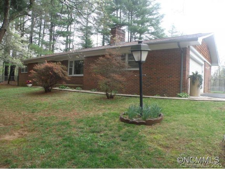 Totally remodeled, well maintained home on wonderful, gorgeous level .78 acre lot w/fenced backyard, brick FP, ht pump, updated kitchen, AHS Home Warranty, 2 outbuildings,  2-car garage, great convenient location, very quiet street. in-ground pool "as-is" needs work.