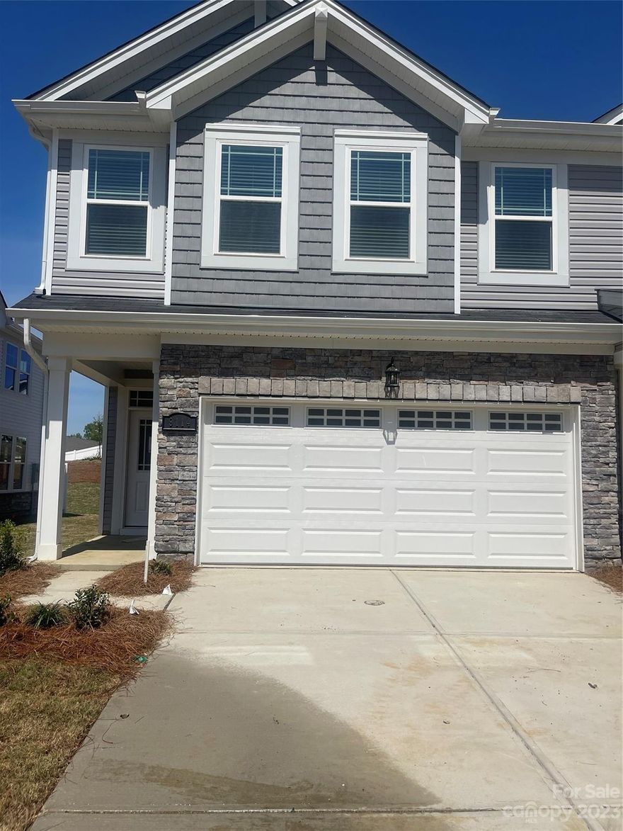 Our Classic series Large open concept main floor with huge island for entertaining friends. Dining area and gathering room all open to the kitchen.  Upstairs large primary room with tray ceiling, tile in bathrooms and quartz countertops and generous secondary bedrooms and full bathroom. These are Designer Quick Move-In Homes with all the details and upgrades already included in the list price of the home.  Quality and style at an exceptional price, located in an exceptional area.  Minutes away from 485/Mallard Creek with shopping, schools and parks all at your finger tips. This Blayre is an END UNIT backing to common open space. READY TO MOVE IN JUNE!!