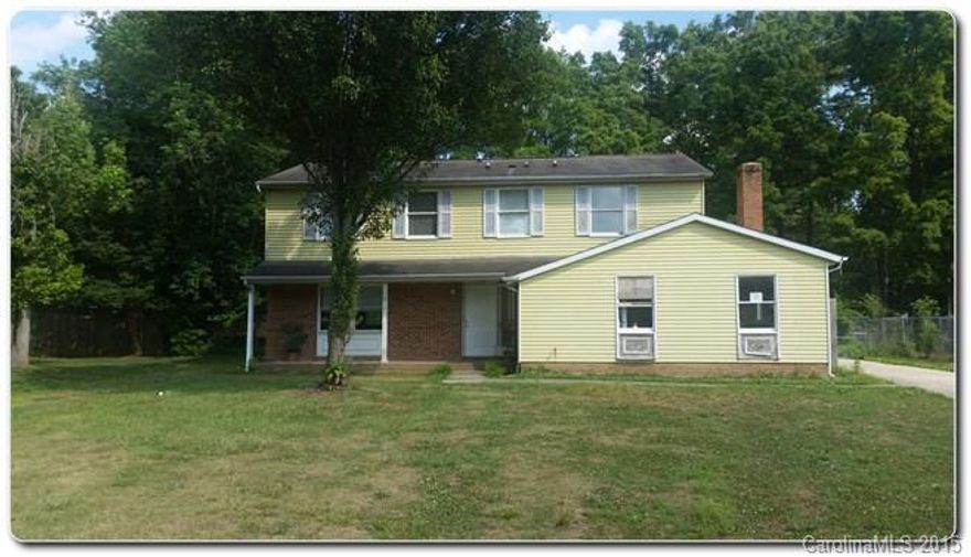 Charming two story home!! Spacious den with cozy fireplace. Large kitchen with lots of cabinet space! Bonus room on the first floor. Master suite and three bedrooms on the second floor. Largest lot on the block! Perfect opportunity to add your personal touch. Downstairs bathrooms are missing sinks/fixtures/tub.