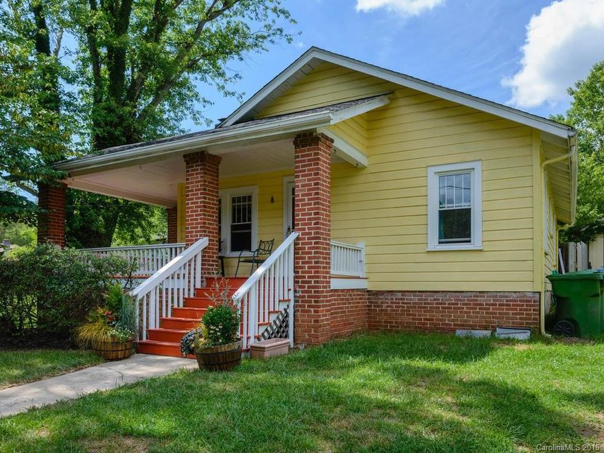 Hidden Gem in North Asheville.  Storybook Bungalow on private lane surrounded by pastoral beauty.  Hardwood Floors, wrap around front porch, private fenced backyard with patio. Detached garage.